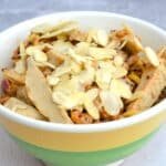Quorn vegetarian coronation chicken salad in a yellow and green bowl